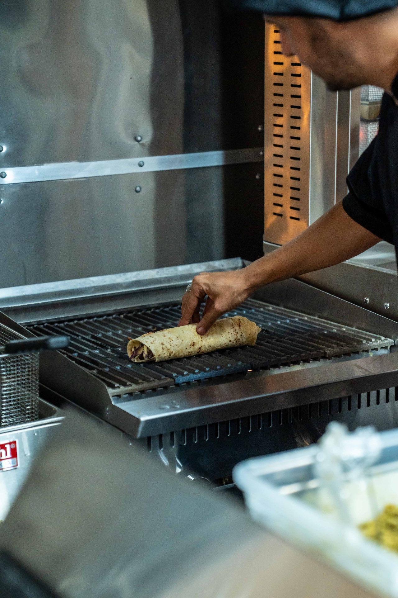 Shawarma wrap toasting on the grill
